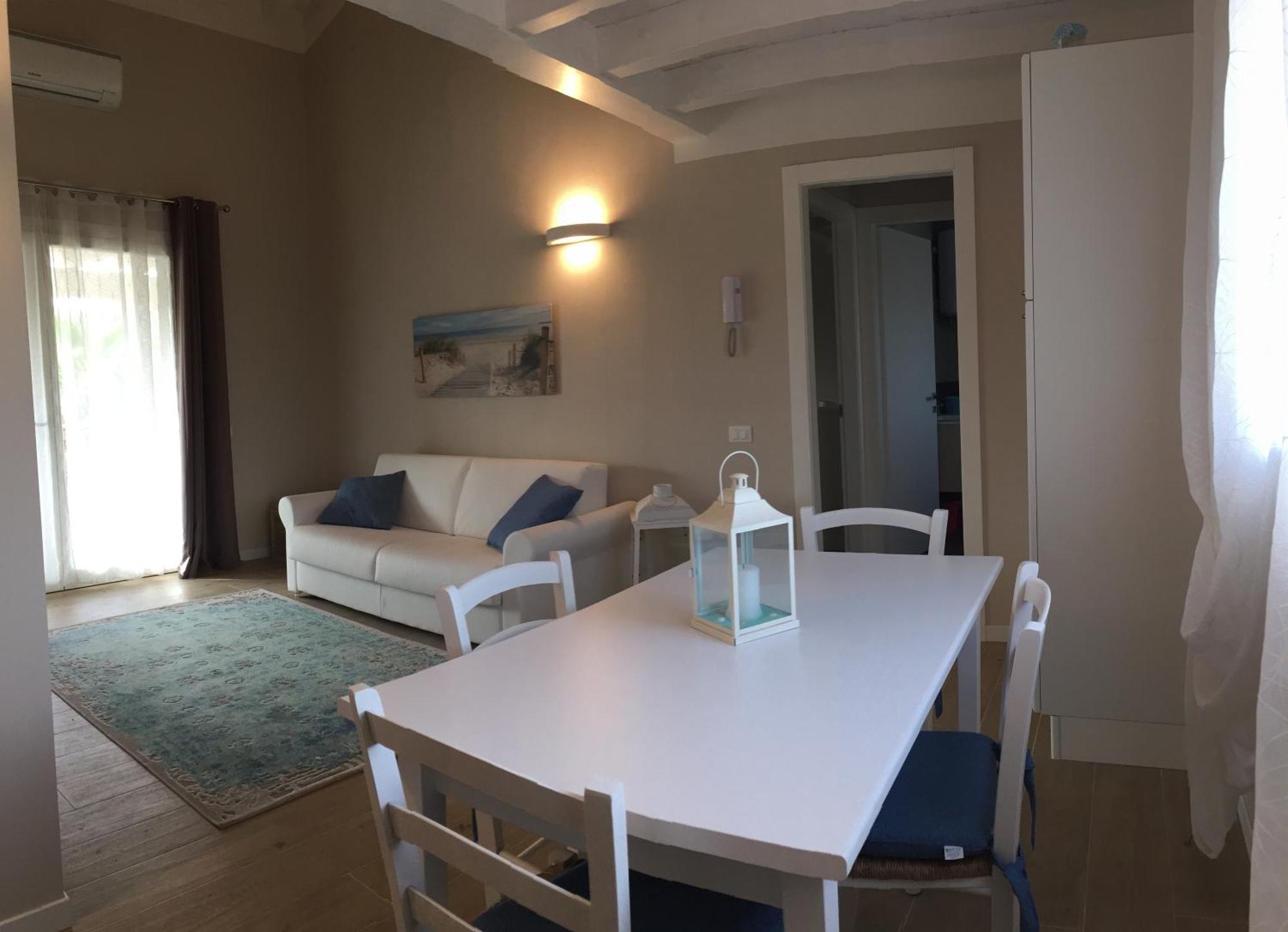 Residence Elegance Ville Ed Appartamenti A Porto Pino Exterior photo