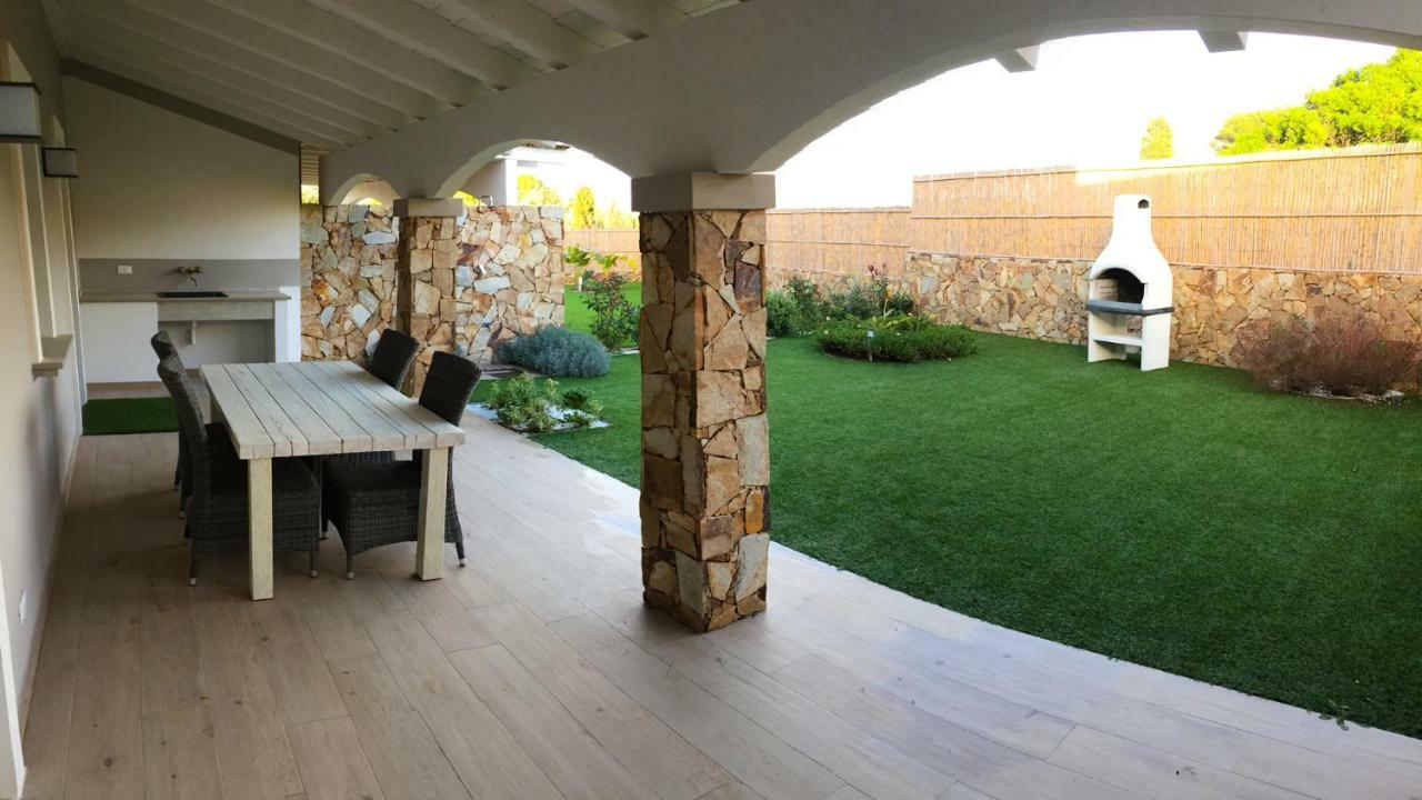 Residence Elegance Ville Ed Appartamenti A Porto Pino Exterior photo